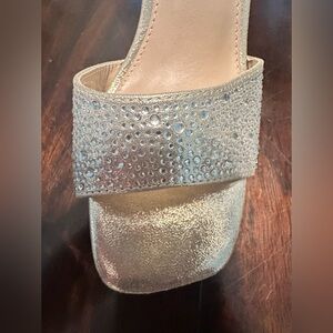 Light gold shimmer sand fabric heels.